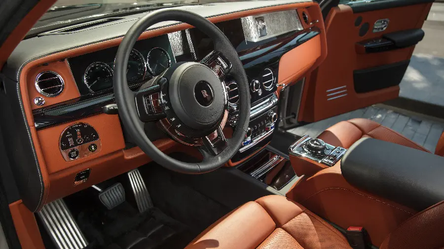 Awesome wallpaper of Rolls Royce interior with a combination of brown and black leather