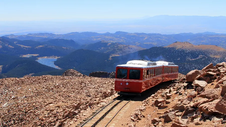 Awesome Stock Photo of a Train Passing Through a Mountain in Super Quality
