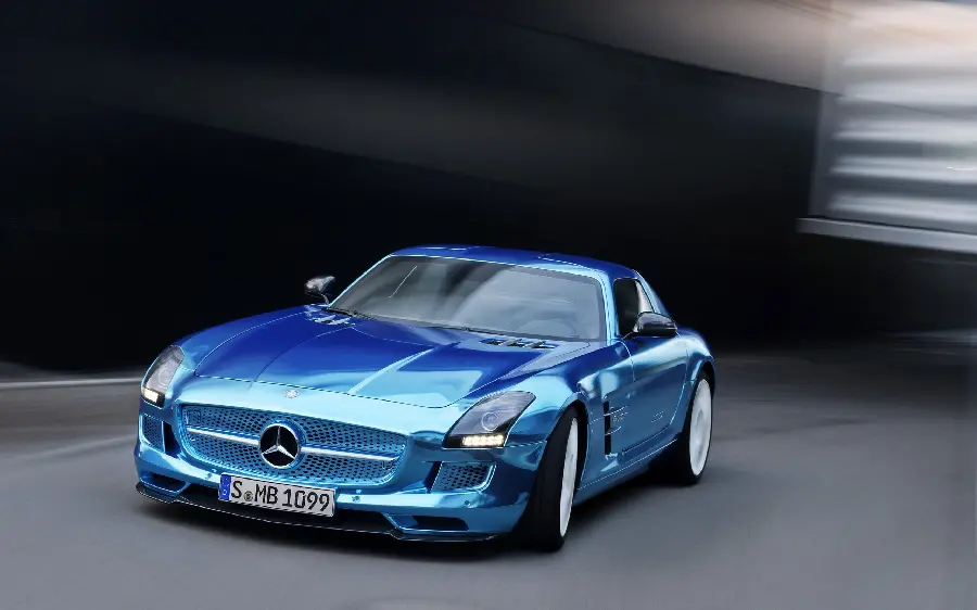 Awesome image of a small blue Mercedes-Benz on a blurred background