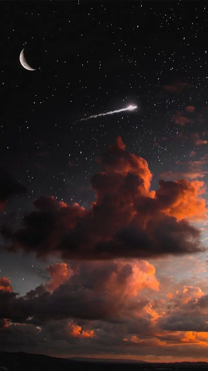 Download the exceptional and new background image of the night sky and orange and black clouds with a crescent moon and bright stars