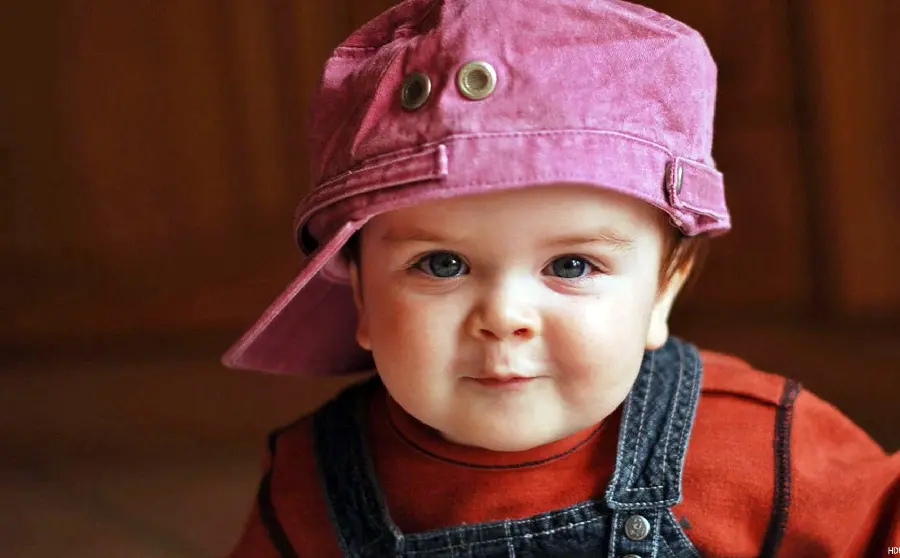 New computer background with a naughty smile of a little boy