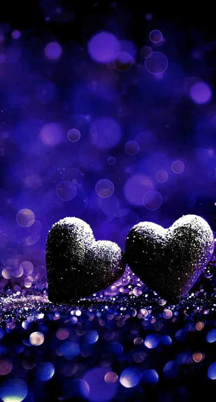 Download a lovely romantic background of two purple wreath hearts