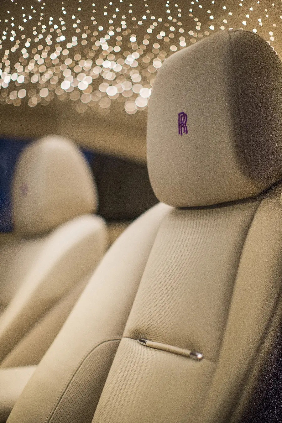 HD background of the colorful design inside the Rolls Royce car