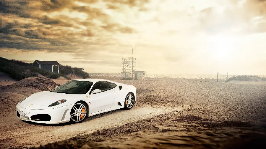 Download a picture of a white Ferrari fast in the dry desert