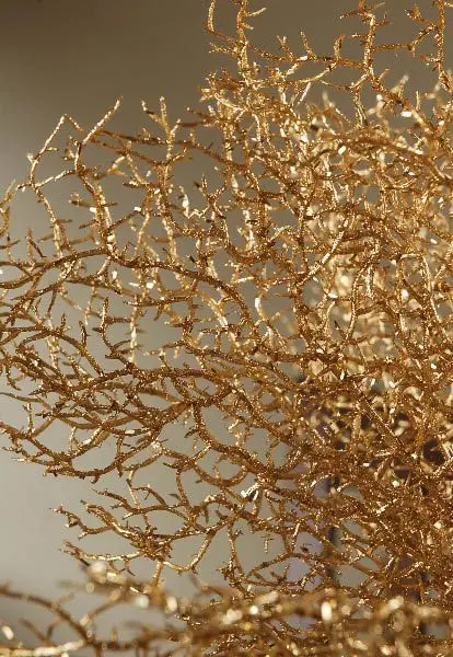 A crowded poster of bright and shaggy golden flowers and branches