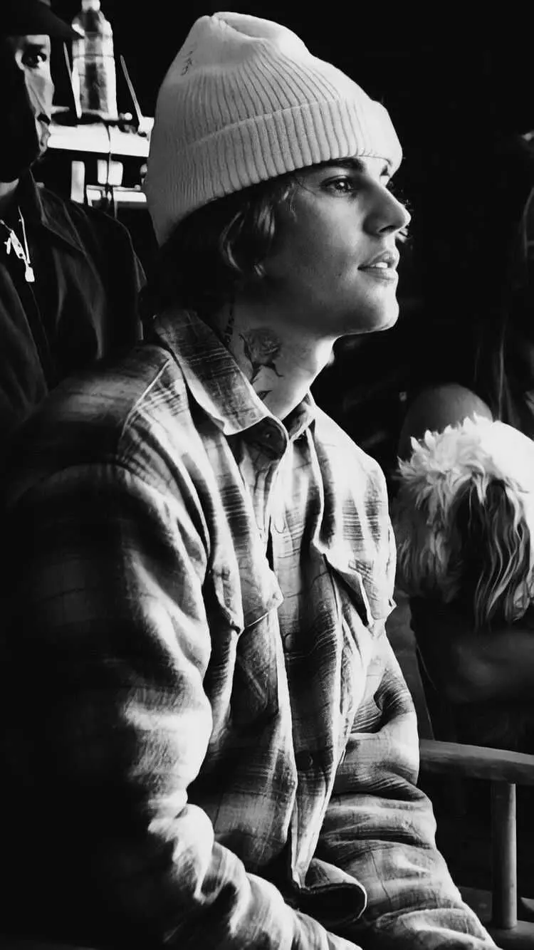 Black and white background of Justin Bieber with winter style 