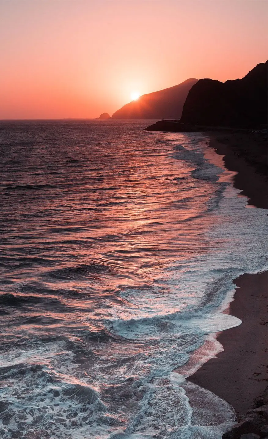 Unique and new special phone background photo of a beautiful sunset in the sky by the sea with hd quality