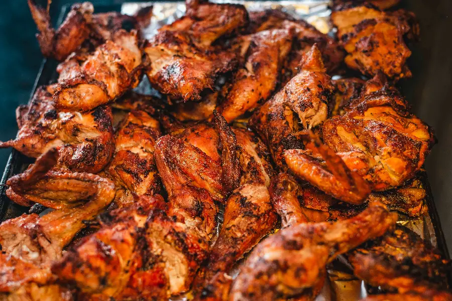Full HD background of roasted chicken wings in an oven tray