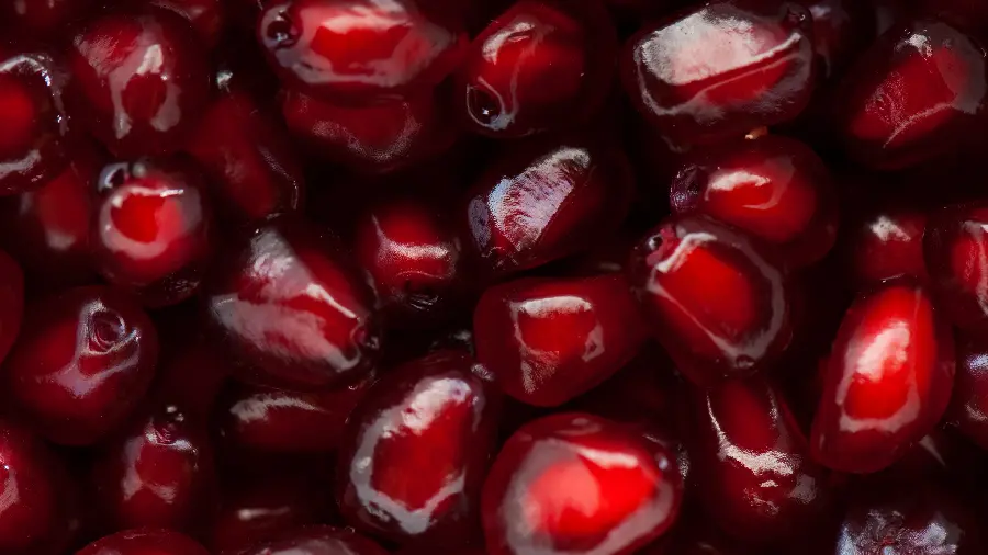 Beautiful wallpaper of red pomegranate seeds and small for laptop 