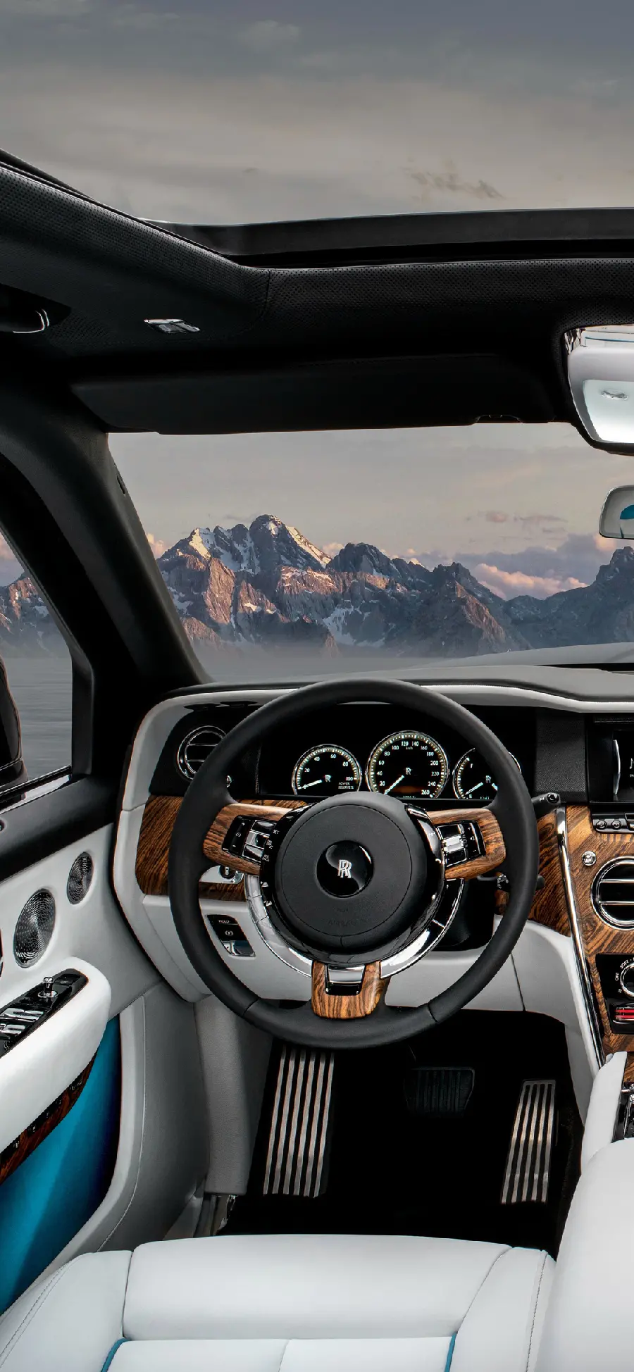 Amazing Rolls Royce wallpaper with a combination of wood design and white and black colors