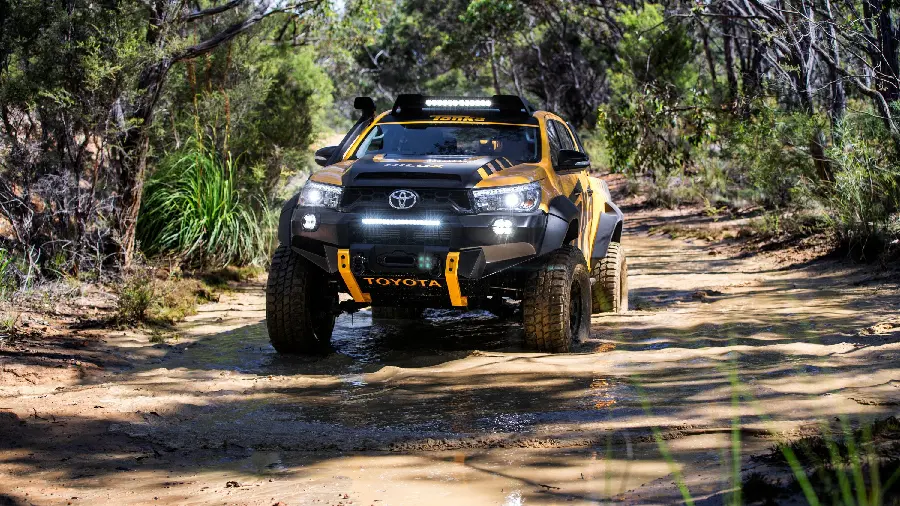 The latest magnificent background of Toyota Hilux in the green forest