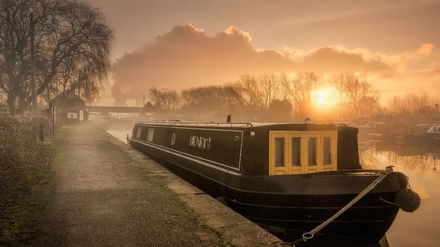 Magical laptop background of a cool boat in foggy weather