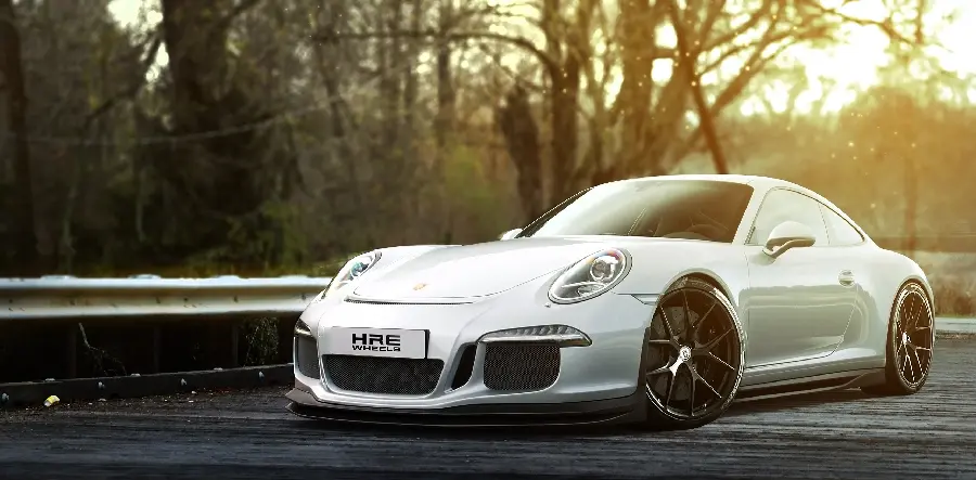 The most stylish backg Grand White Luxury Car On The Road For Computer 