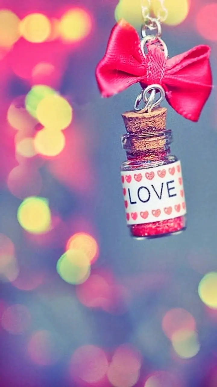 Download beautiful girly wallpaper in pink with the title LOVE