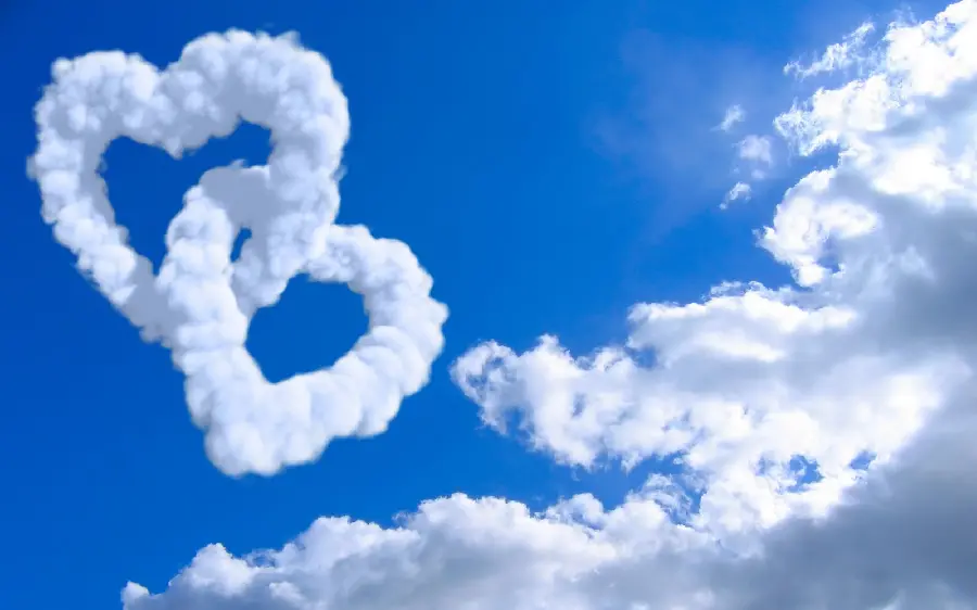 A spectacular background with a design of endless love in a beautiful cloudy sky for your desktop