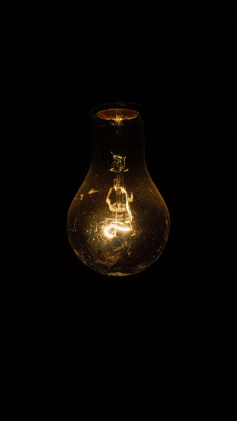 Simple and special background photo of a light bulb with a dark background
