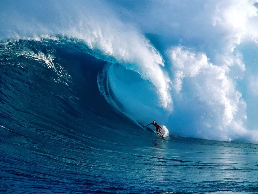 Stunning image of a surfer Eri on the raging waters