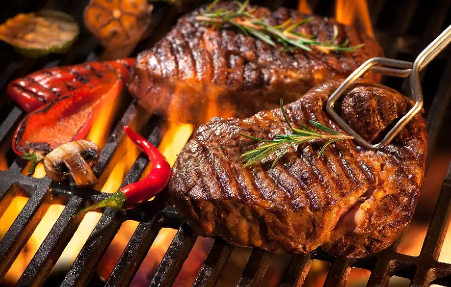 Beautiful photo of steak meat on fire