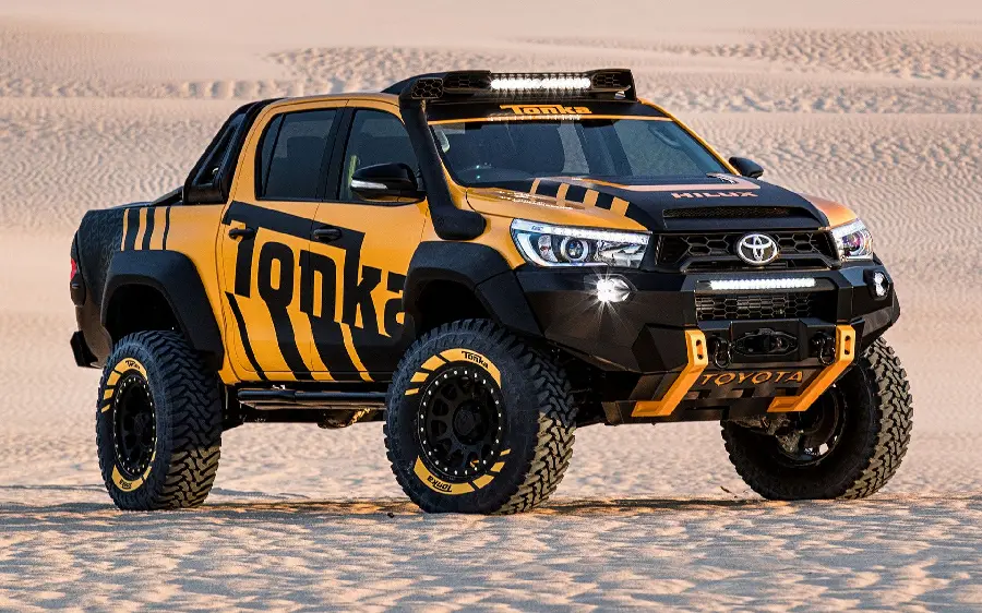 Download the background of the unrivaled Toyota luxury off-road in the desert