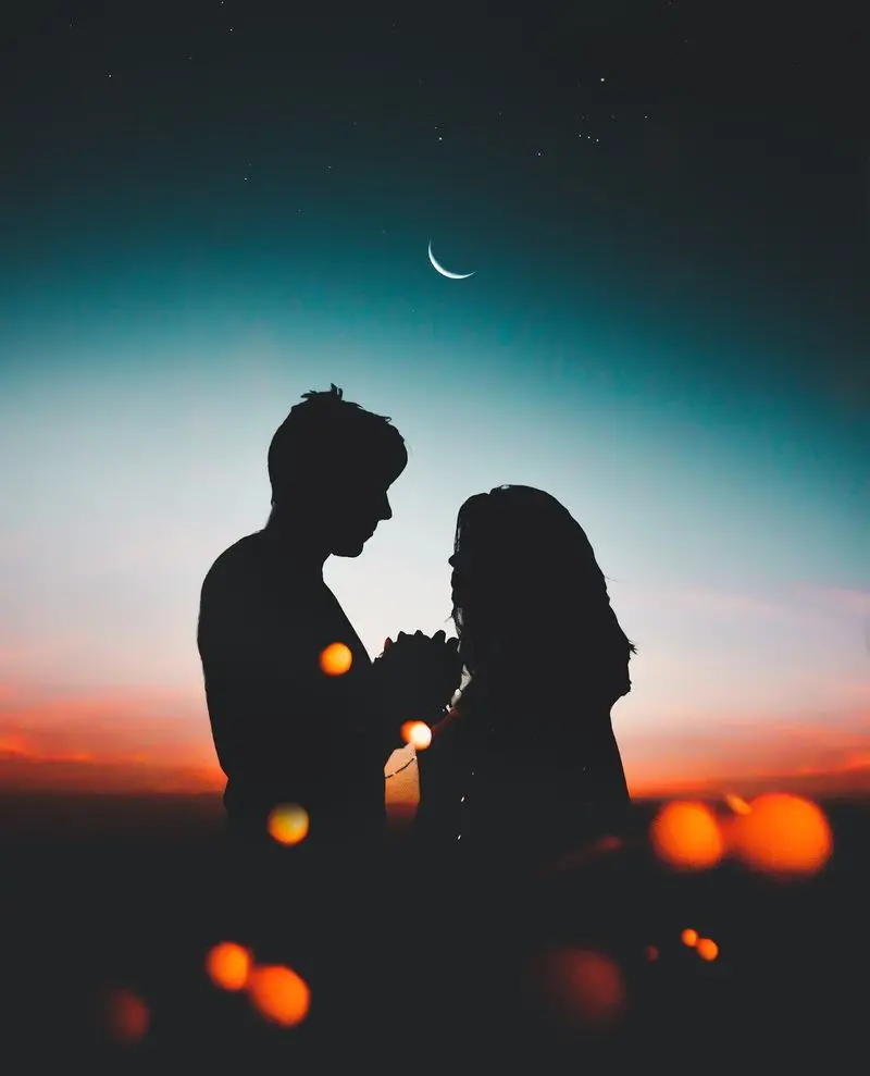 Black romantic fantasy image of a kind bride and groom