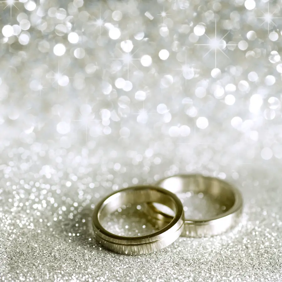 Download shiny silver poster of two silver rings of the bride and groom in HD quality