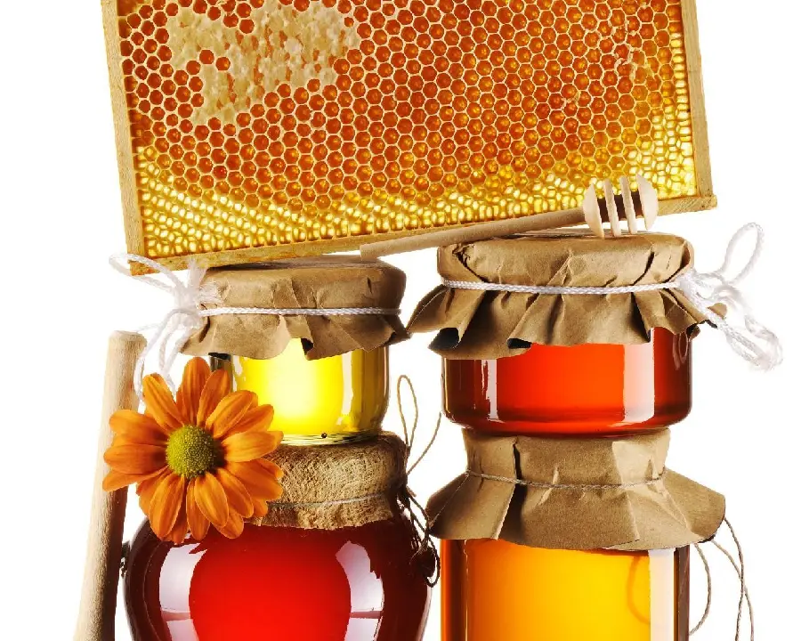 Interesting profile picture of bottles full of delicious and sparkling honey