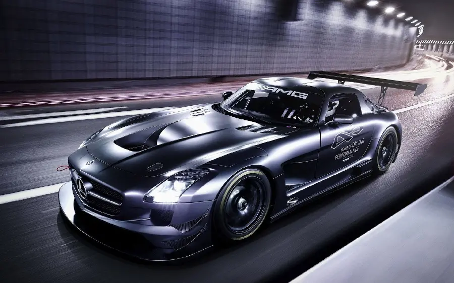 The most expensive Mercedes-Benz SUV with lights on while driving on the road