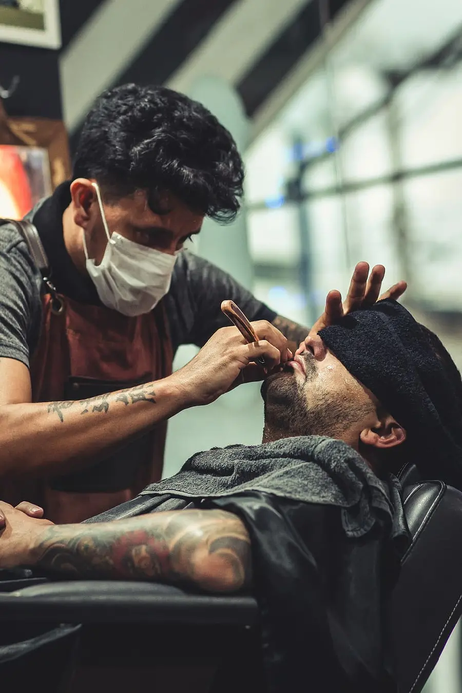A very high quality photo of a male barber for an Instagram post