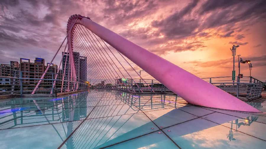 A huge pink city structure in a pleasant artistic frame