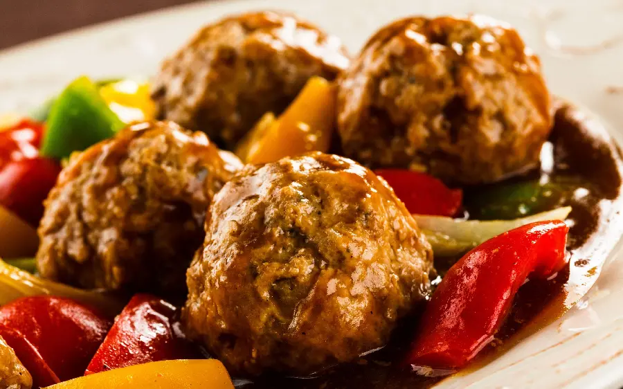 Download HD quality background of food Popular and delicious meatballs with bell peppers