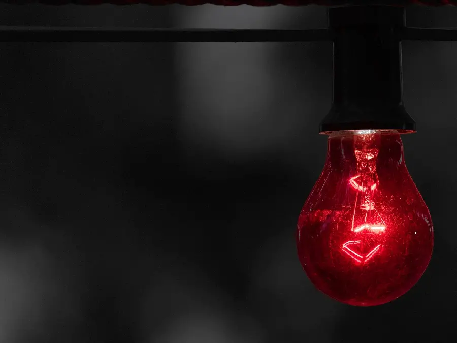 Mysterious and interesting background photo of a lamp with red light
