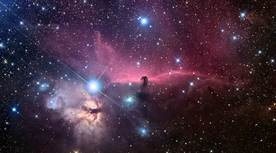 The most popular background image of the Horsehead Nebula with its glittering colors