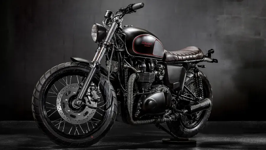 Eye-catching photo of a black motorcycle parked crookedly in 2022