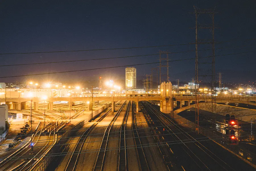 Image of different city train tracks and routes at night