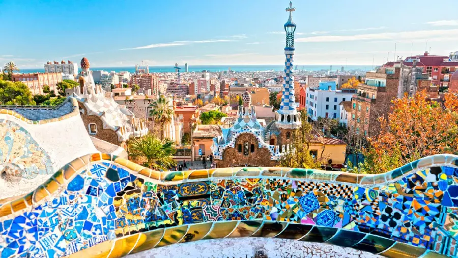 Download a beautiful stock photo of the city of Barcelona from the terrace of Park Guell in high quality for your phone
