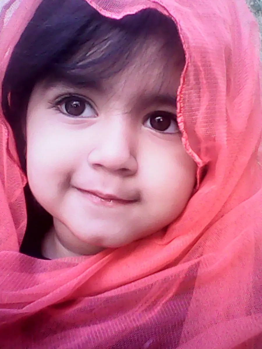 Popular profile photo of a beautiful baby girl with a pink scarf 