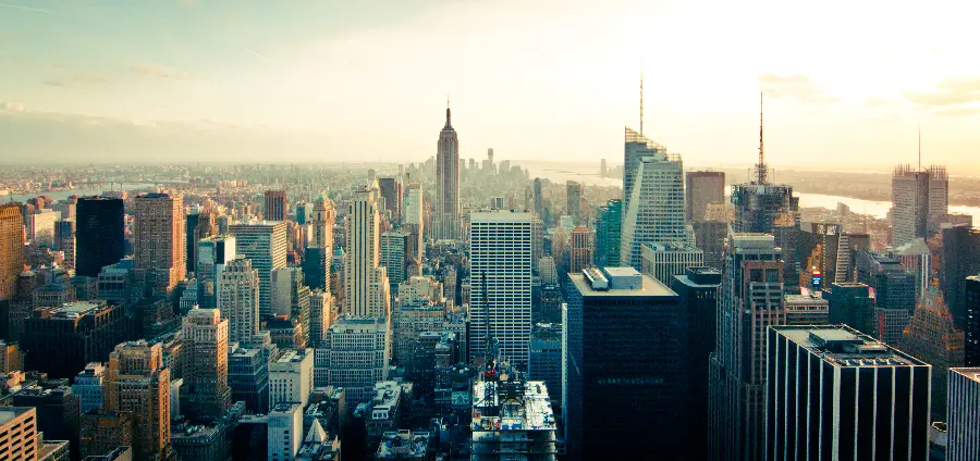 Download a dirty industrial city background with new buildings and technologies
