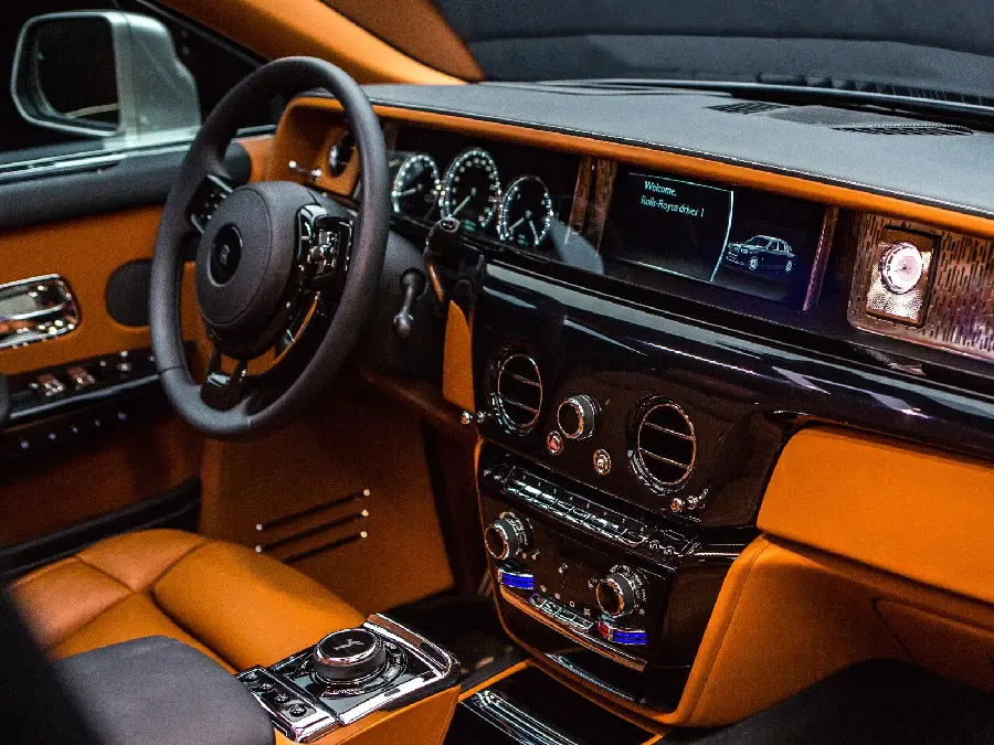 Download a spectacular stock photo of the left and bright orange interior of a Rolls Royce