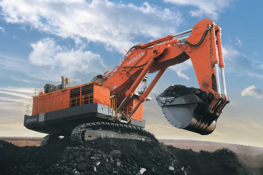 Interesting view of a large excavator harvesting soil