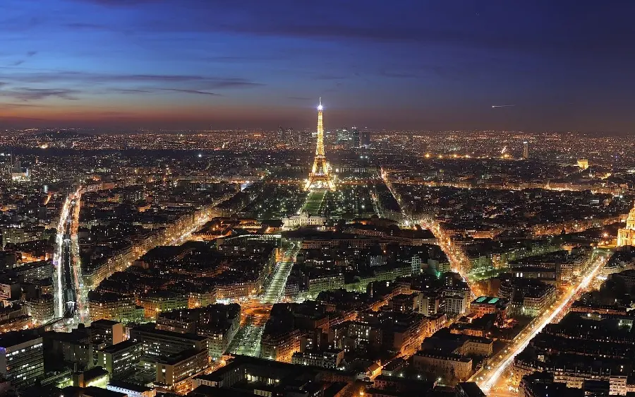 A unique mobile background image of the texture of the city of Paris, a symbol of the culture of France at night