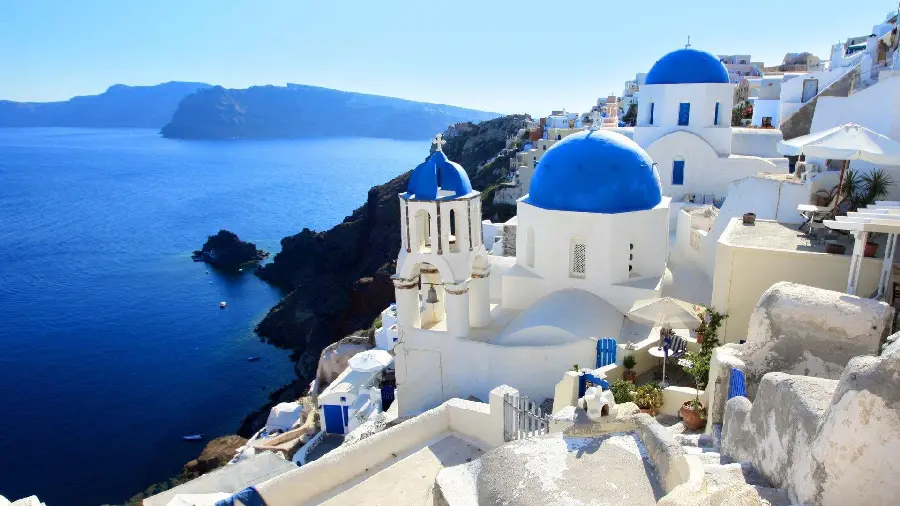 A Spectacular Photo of the Cute Blue Domes of Santorini Island Suitable for Telegram