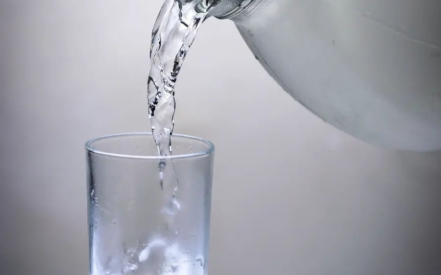 Pure Moment Background of Pouring Cool and Refreshing Drinking Water into a Glass