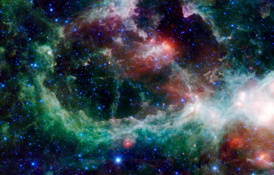 Lovely background of the green and red heart nebula and blue lights in hd quality
