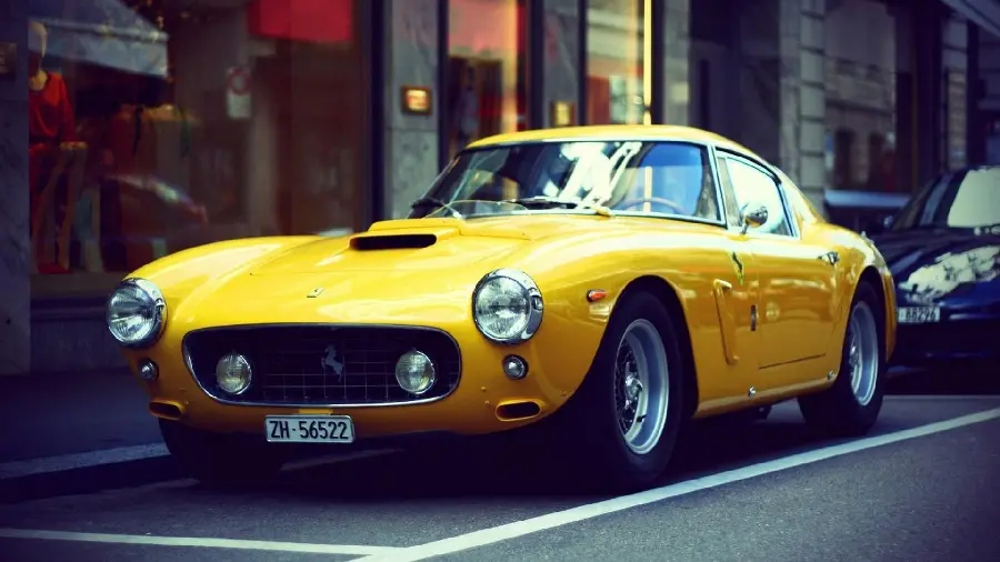 Popular profile picture of a classic old yellow Ferrari in high quality for Instagram