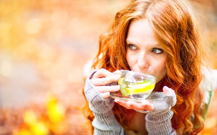The most viewed photo of a brunette girl drinking in nature