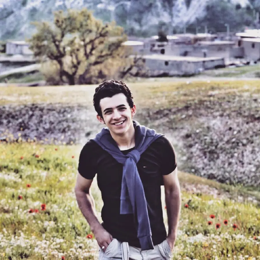 Ali Shadman smiling and attractive background in the heart of nature