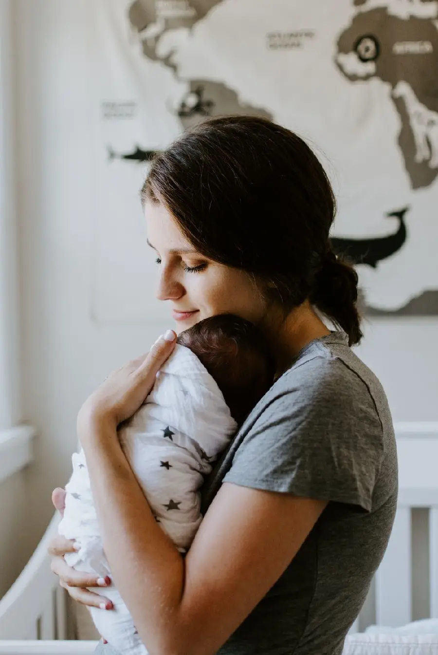 New Stock Photo with Mother's Kind Embrace for Baby