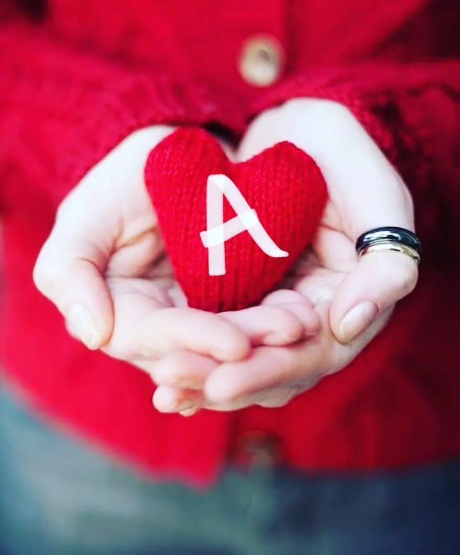 A spectacular red heart image with the title of the English letter A for profiles in 4k quality
