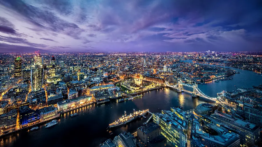 Download a unique vector of all the structures of a city with a purple sky