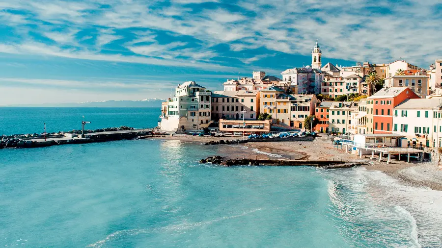 Amazing view of the dreamy white village on the edge of the blue sea